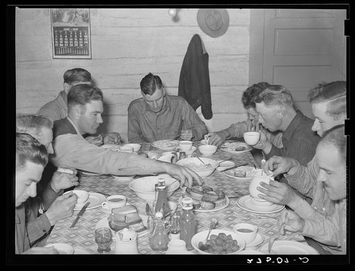 Cowhands at dinner. Quarter Circle 'U' Ranch, Montana