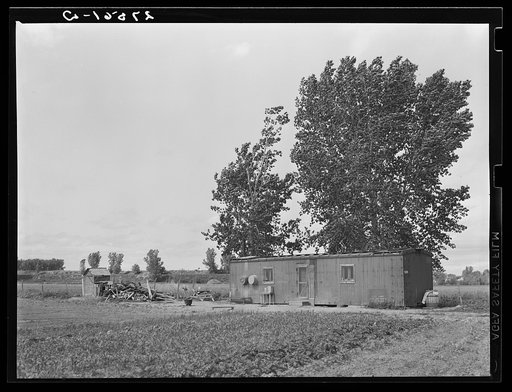 Untitled photo, possibly related to: Boxcar home for sugar beet workers. Treasure County, Montana