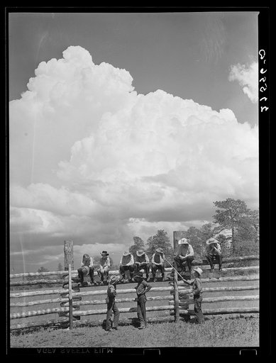 Cowhands and dude girls at Three Circle roundup. Custer National Forest, Montana