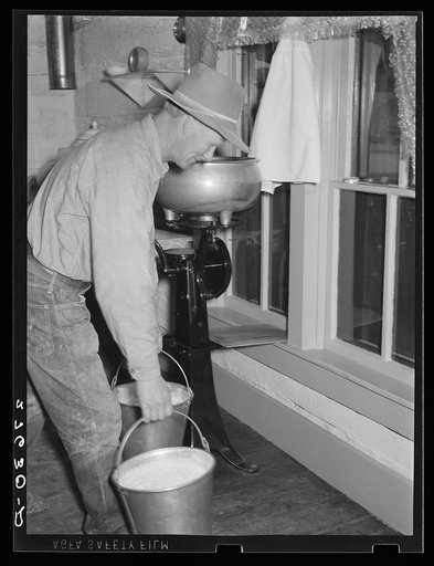 Untitled photo, possibly related to: Running cream separator. Quarter Circle 'U' Ranch, Montana