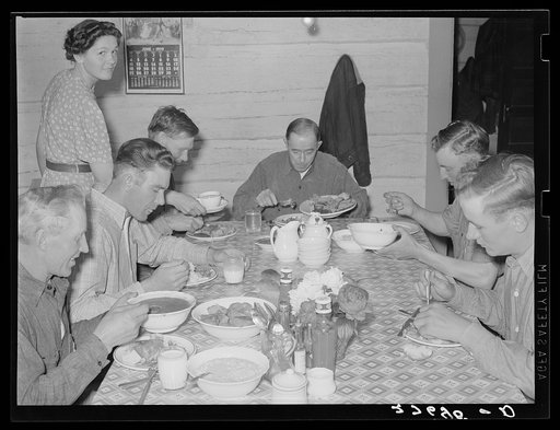 Untitled photo, possibly related to: Cowhands at dinner. Quarter Circle 'U' Ranch, Montana