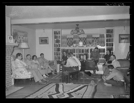 Dudes in living room of main house. Quarter Circle 'U' Ranch, Montana