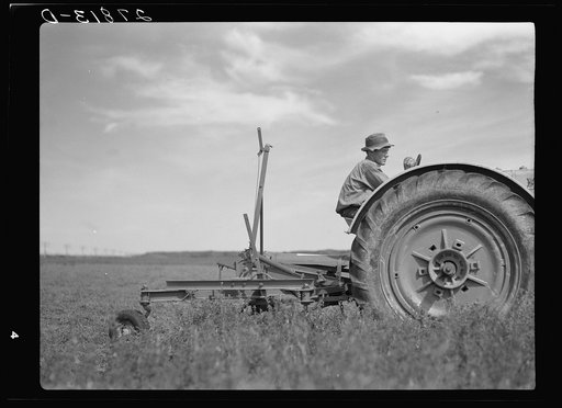 Untitled photo, possibly related to: Tractor used in cutting alfalfa. Rosebud County, Montana