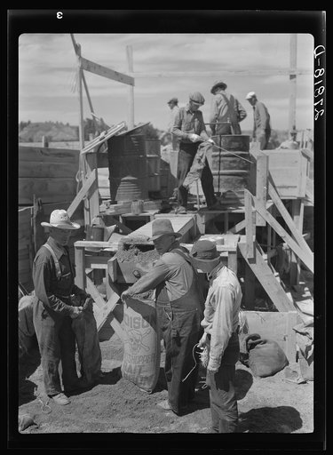 Untitled photo, possibly related to: Filling a bag with poison bait for grasshoppers. Forsyth, Montana