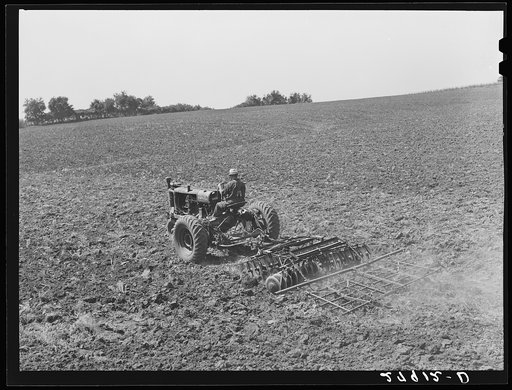 Pulling disc and harrow across plowed field. Kimberley farm, Jasper County, Iowa