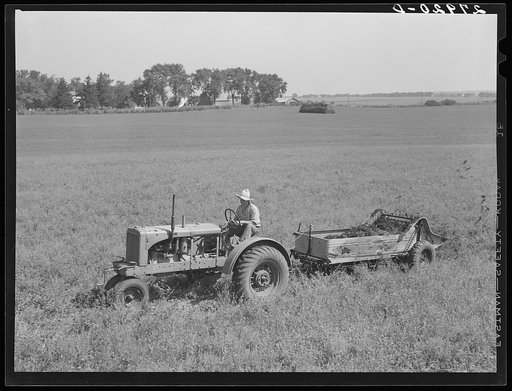 Spreading manure. Kimberley farm, Jasper County, Iowa