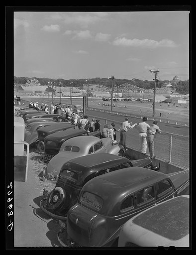 Spectators at auto races. Iowa State Fair, Des Moines, Iowa