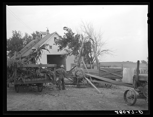 Untitled photo, possibly related to: Grinding corn for cattle feed. Leo Gannon farm, Jasper County, Iowa