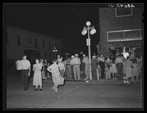 Main street on Saturday night. Iowa Falls, Iowa