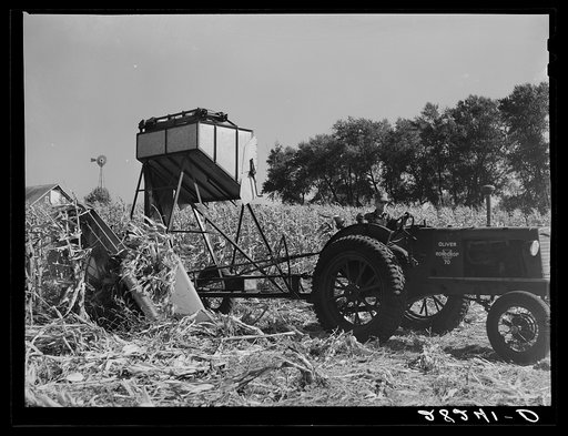Cone-row puller type of mechanical corn picker. Robinson farm, Marshall County, Iowa