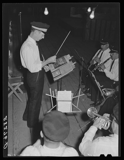 Leader of the municipal band. Central Iowa Fair, Marshalltown, Iowa