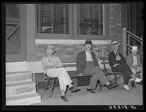 Farmers in town on Saturday night. Grundy Center, Iowa