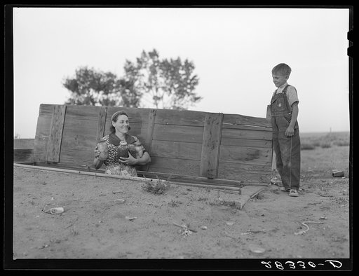 Mrs. Fred Schmeeckle, FSA (Farm Security Administration) borrower, with her son. Weld County, Colorado