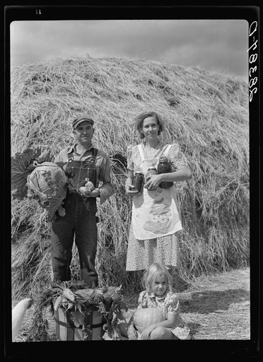 Mr. and Mrs. Howard Crowder and daughter, resettlement clients. San Luis Valley, Colorado