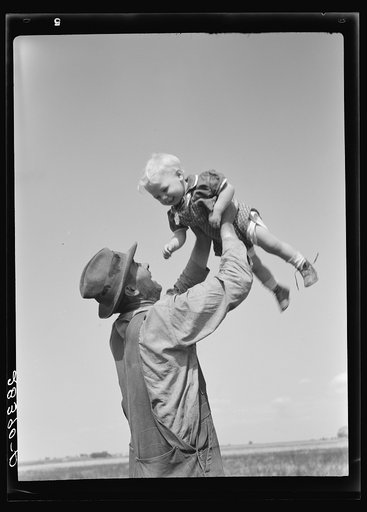 Untitled photo, possibly related to: Mr. Calvin Brown and grandson, Eaton, Colorado. FSA (Farm Security Administration) borrower