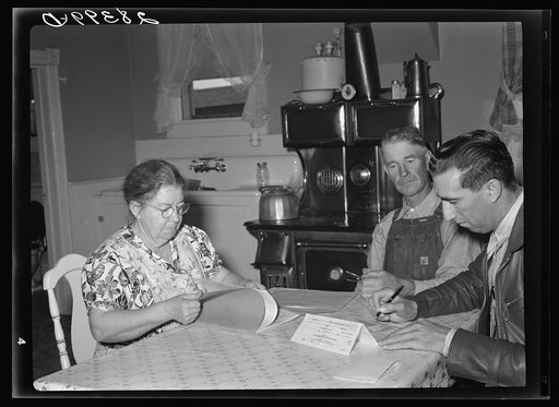 Untitled photo, possibly related to: Mr. and Mrs. Milton Robinson with FSA (Farm Security Administration) supervisor. Weld County, Colorado