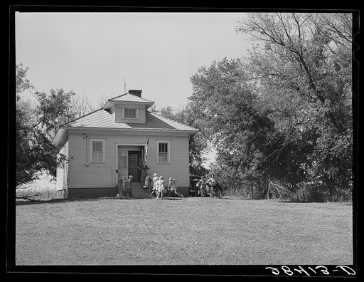Untitled photo, possibly related to: Children wave goodby to their teacher as they leave school. Grundy County, Iowa