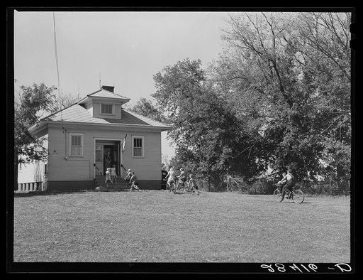 Children arrive at one room school house. Grundy County, Iowa
