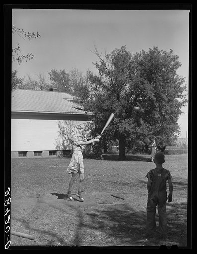 Pupils of one room school house playing ball during recess. Grundy County, Iowa