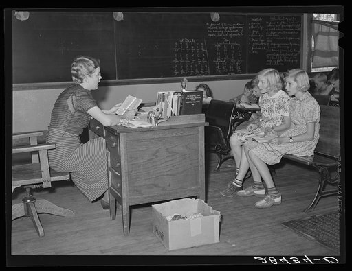 Lois Slinker teaching the fifth grade in one-room schoolhouse. Grundy County, Iowa