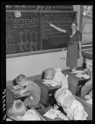 Lois Slinker and some of her pupils in one-room schoolhouse in Grundy County, Iowa
