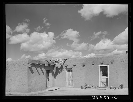 Spanish-American adobe house. Peppers drying on stick. San Pablo, Colorado