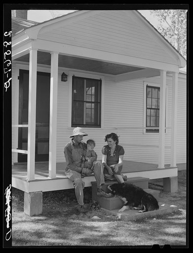 Carl Higgins family, tenant purchase borrowers, on their farmstead. Mesa County, Colorado