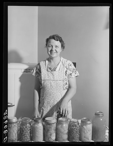 Mrs. Thomas Beede with preserved food. Western Slope Farms, Colorado