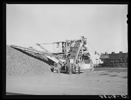 Untitled photo, possibly related to: Machine for unloading sugar beets from farmers' trucks at railroad. Adams County, Colorado