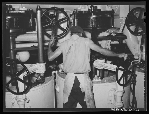 Untitled photo, possibly related to: Operating a centrifugal machine. Sugar beet factory. Brighton, Colorado