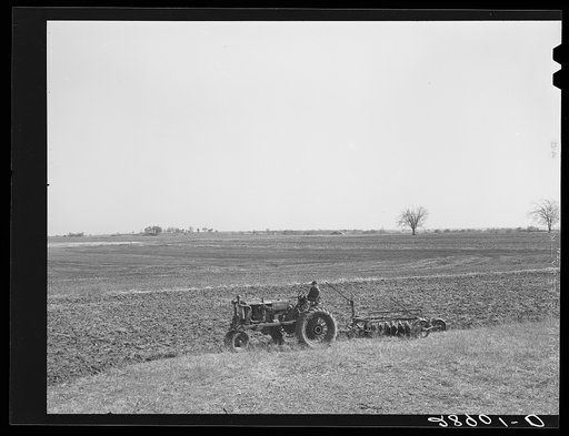 Untitled photo, possibly related to: Large scale farming with tractors means greater profits on the Bois d'Arc cooperative. Osage Farms, Missouri