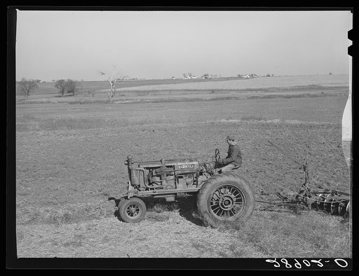 Untitled photo, possibly related to: Large scale farming with tractors means greater profits on the Bois d'Arc cooperative. Osage Farms, Missouri