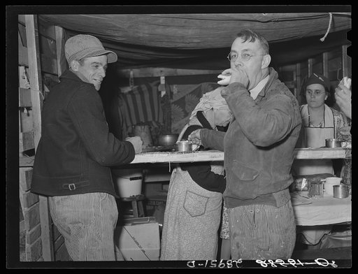 Farmer at lunch stand. Cornhusking contest. Marshall County, Iowa