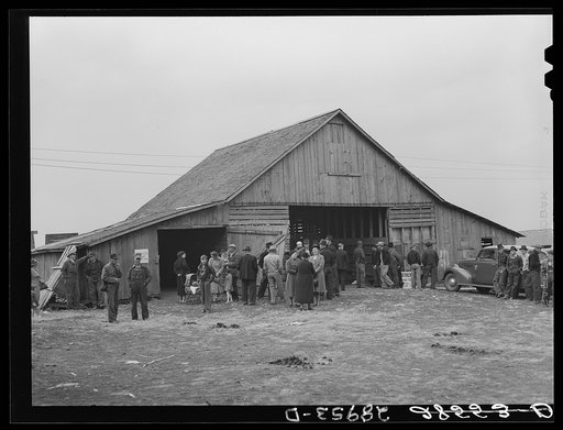Farmers and their families gather around barn before cornhusking contest. Marshall County, Iowa