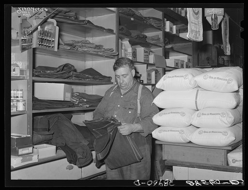 Farm clothes and flour. General store. Lamoille, Iowa