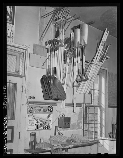 Farm implements and egg candler. General store. Lamoille, Iowa