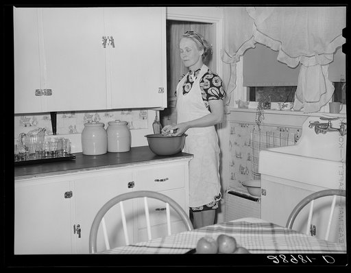 Untitled photo, possibly related to: Fred Maschman, TP client, and his wife did most of the work of remodeling their new farmhouse. Iowa County, Iowa