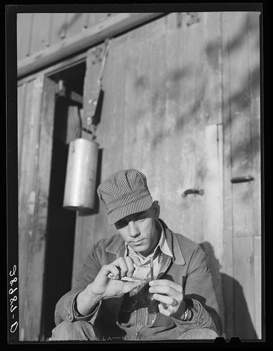 Small farmers hire a scientist. Measuring the butter fat content in a sample of milk. Every farmer today must make use of the modern methods if he is to obtain the maximum income from his farm. Black Hawk County, Iowa