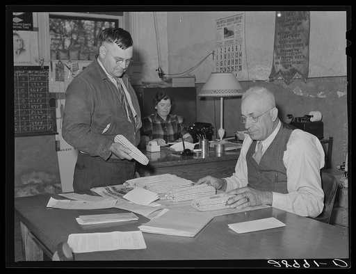 County agent with H.C. Clark, farmer who grows hybrid seed corn. Grundy Center, Iowa