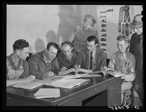 Members of the Bois d'Arc Cooperative looking over their accounts. Osage Farms, Missouri