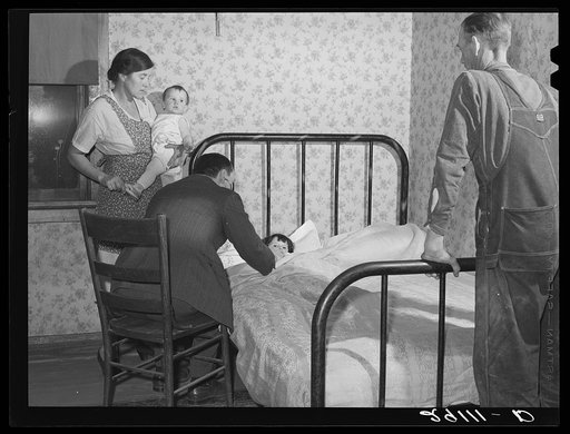 A physician cooperating with FSA (Farm Security Administration) medical health plan visits the home of a rehabilitation client. Saint Charles County, Missouri