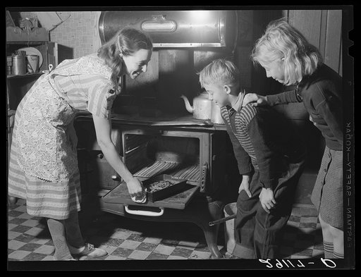 The FSA (Farm Security Administration) county home supervisor helps Mrs. Dixon plan a practical way of managing her household. Saint Charles County, Missouri