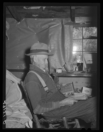 Grandfather of family living in paw-paw patch in the center of tiff miners. Washington County, Missouri
