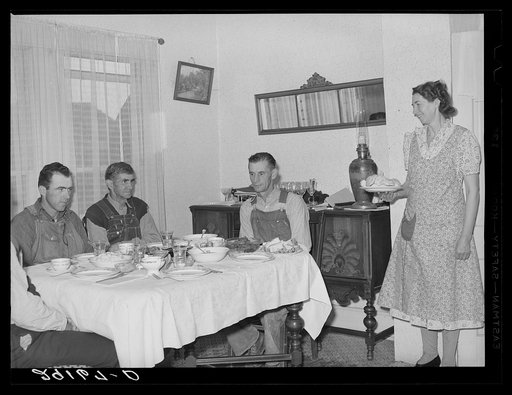 Farmers at dinner. Greene County, Missouri