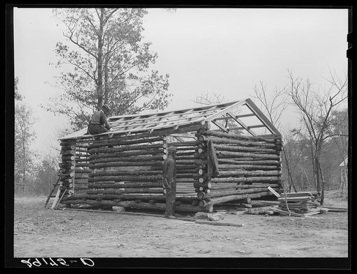 Evicted sharecroppers construct a cabin. Butler County, Missouri