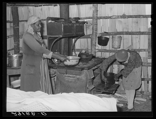A stove in the cabin of an evicted sharecropper. Butler County, Missouri