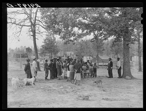 Meeting of sharecroppers who have been evicted from plantation and now live in a temporary camp. Many of these participated in the highway demonstration of January 1939. Butler County, Missouri