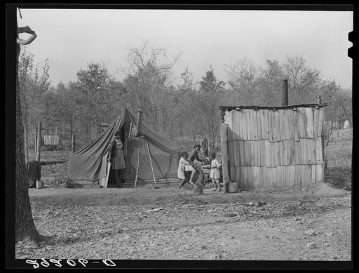 Tent and hut in which evicted sharecroppers live. Butler County, Missouri