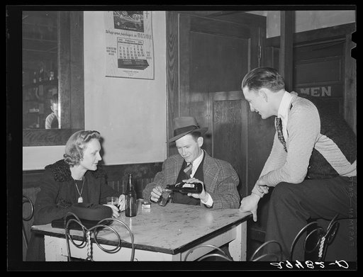 Between dances, couples relax in adjoining beer parlor. Marshalltown, Iowa