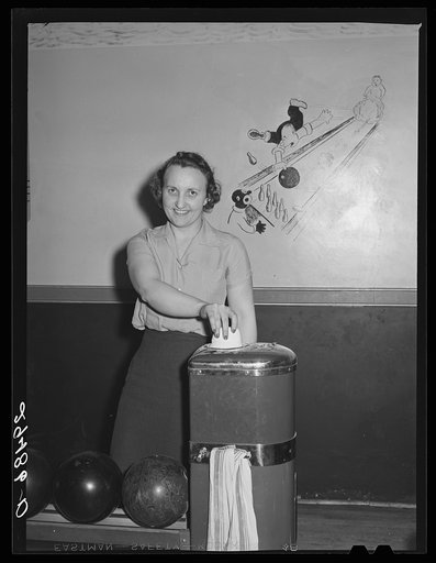 Untitled photo, possibly related to: Girl in bowling alley. Clinton, Indiana